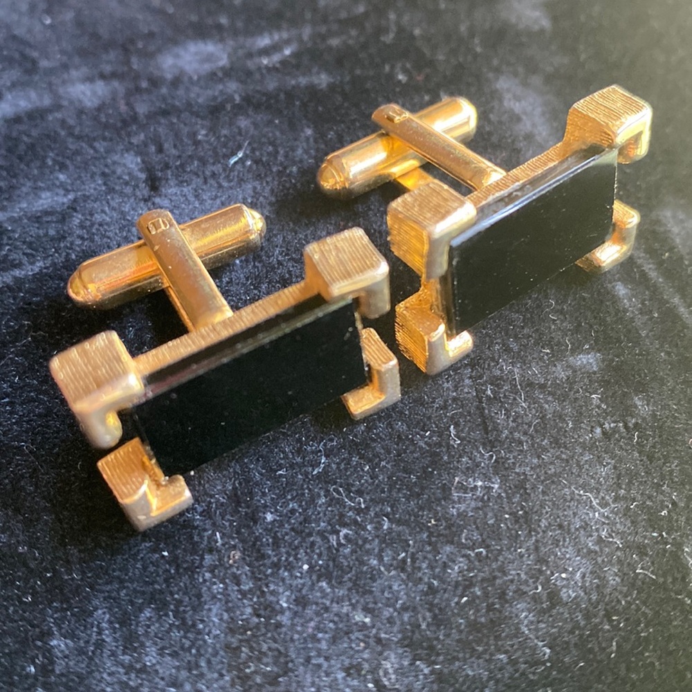 SARAH COVENTRY. "BOLD KNIGHT" Gold tone and black cufflinks